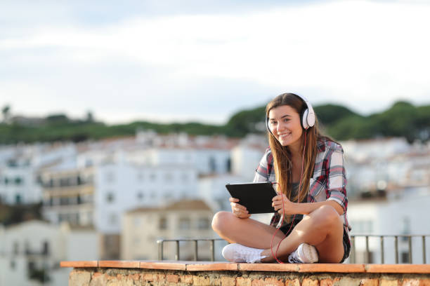 istock Teenage girl e-learning looking at camera 1083743136
