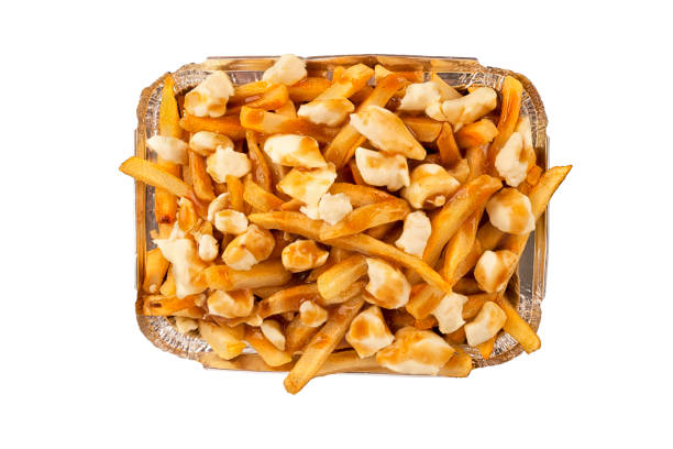 Poutine in an aluminum takeout container. stock photo