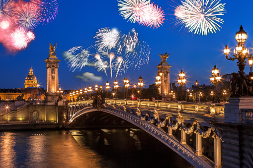 Alexandre III bridge with firework in Paris, France