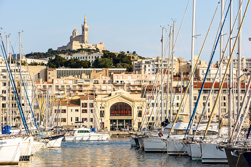 Marina and boats over sunny sky in St Tropez,France