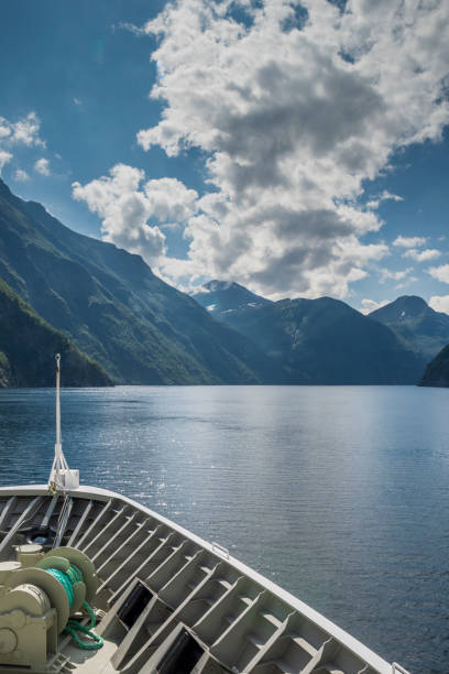 istock Sailing on a Cruise Ship Through a Norwegian Fjord 1083749634