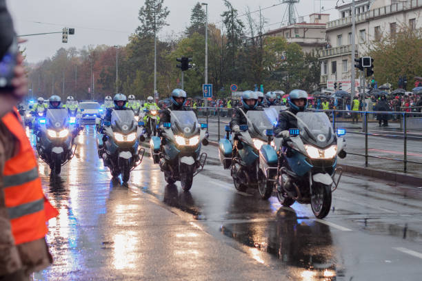 Police workers  of Czech Republic are riding motorcycle on military parade stock photo