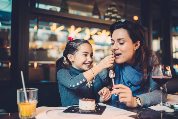 istock Family eating in restaurant 1083759164