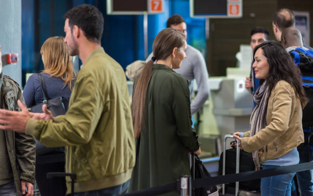 istock Airline Passengers Waiting In Line 1083768648