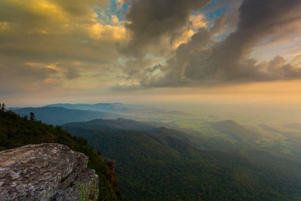 istock Mountain landscape with a rainbow in the sky during sunset 1083774720
