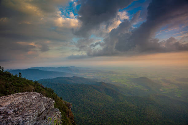 istock Mountain landscape with a rainbow in the sky during sunset 1083774722