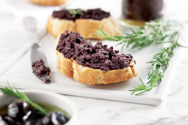 Bread with olive pate,olive puree,black olive Tapenade, stock photo