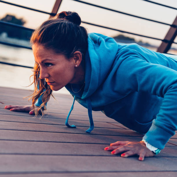 istock Confident Woman Exercising In City 1083789046