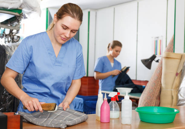 istock Girl working in dry cleaning 1083791910