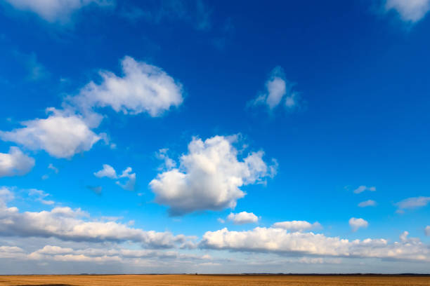 istock White clouds are crossing blue sky 1083792872