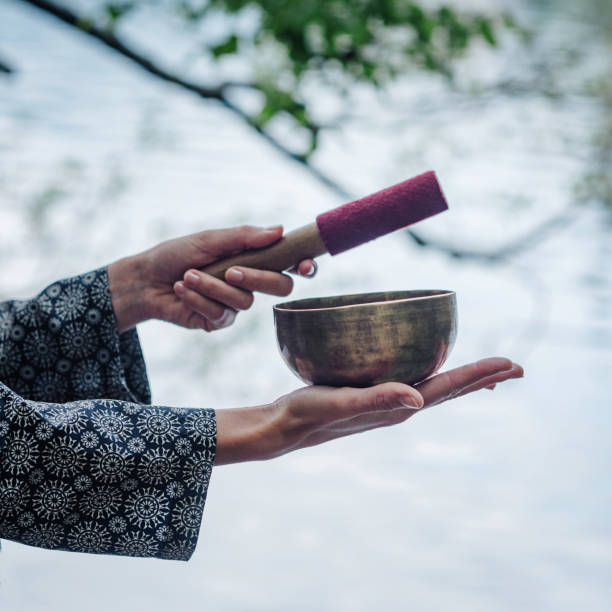 istock Cropped Image Of Hand Holding Rin Gong 1083792956