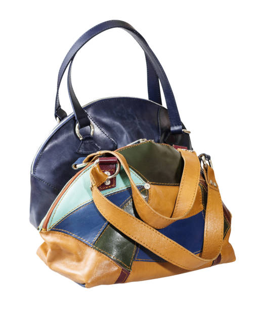 istock side view of two leather handbags isolated 1083793630