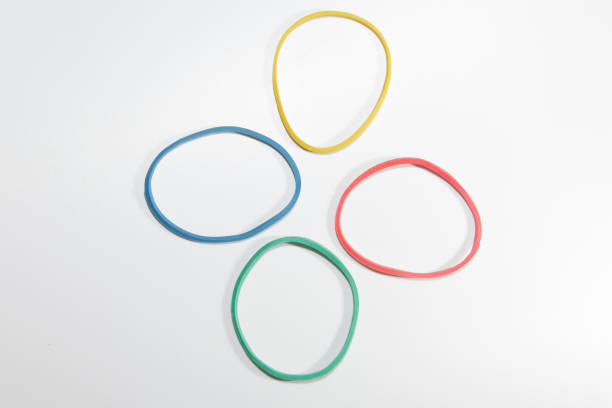 istock High Angle View Of Multi Colored Rubber Bands Over White Background 1083795934