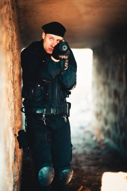 istock Swat Police Officer Shooting With Firearm 1083808230