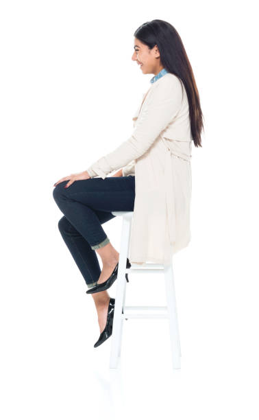 istock Attractive young latino female is sitting 1083809996