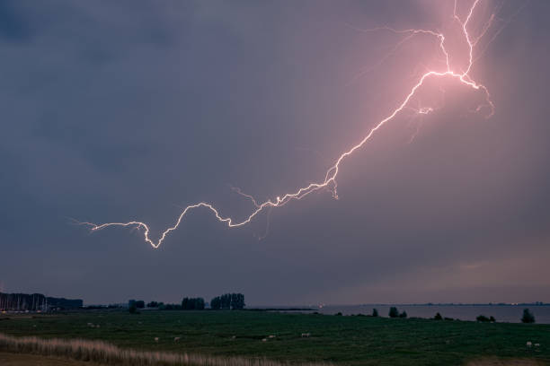 istock Lightning in the sky over Zeeland, Netherlands 1083811354