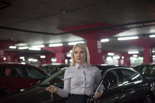 Female car driver tired and worried while driving