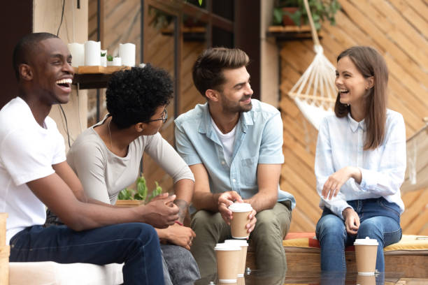 istock Diverse friends having fun together, laughing at joke 1083813398