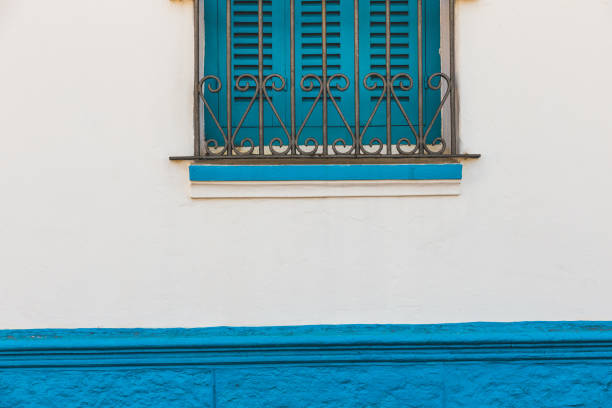 istock Low Angle View Of Blue Window Of Building 1083815866