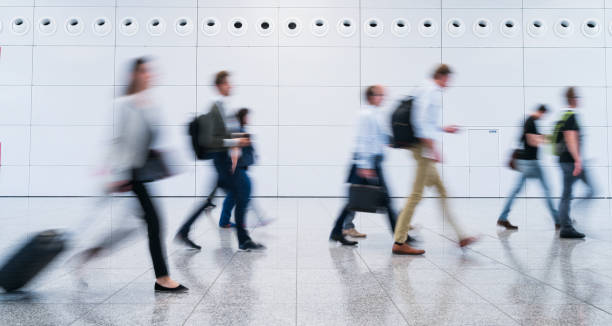 istock blurred business people 1083817048