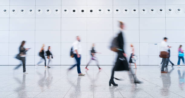 istock blurred business people 1083817050
