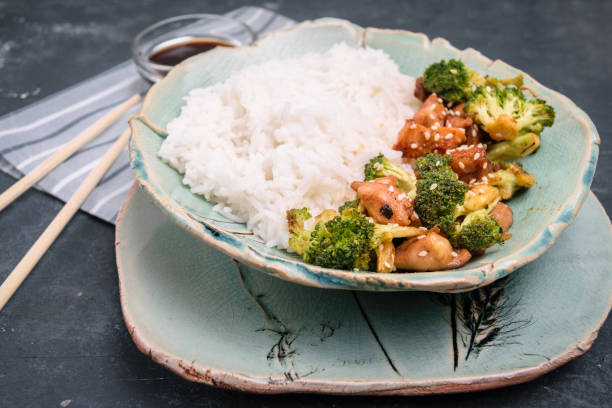 istock Stir fry chicken and broccoli with rice 1083820982