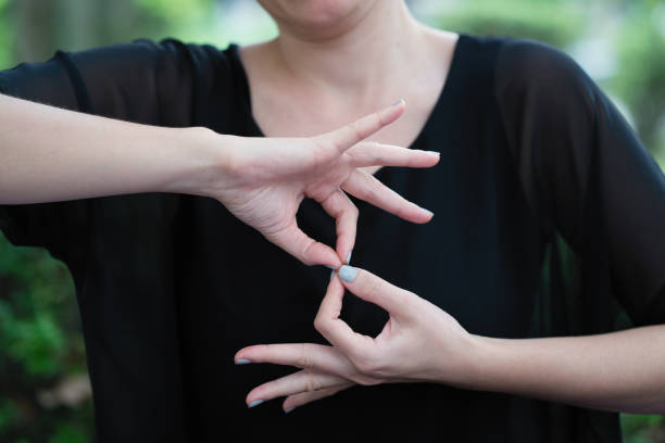 Young woman showing a sign