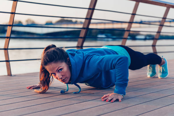 istock Confident Woman Exercising In City 1083822746