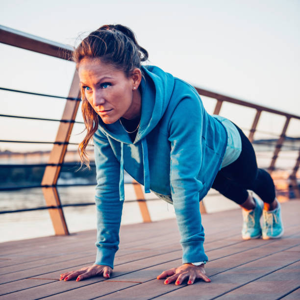 istock Confident Woman Exercising In City 1083822772