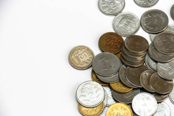 istock Indian rupees coins on white background. 1083827526