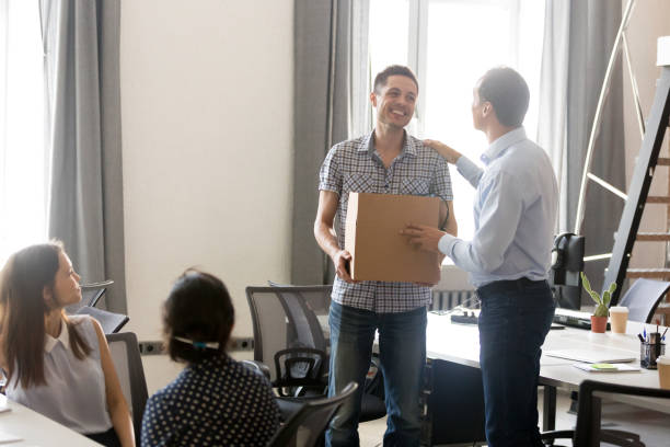 istock Boss introducing just hired male employee 1083827638