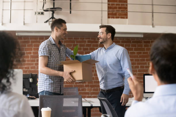 istock Friendly company ceo welcoming new employee 1083827654