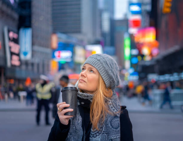 istock Female in Times square during winter 1083850158