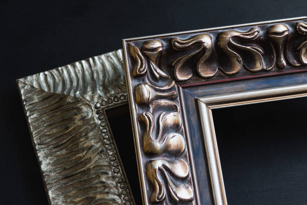 istock Two vintage picture frames on black background. 1083854092