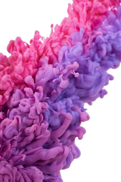 istock Ink in water. Splash paint mixing. Multicolored liquid dye. Abstract  sculpture background color 1083864710