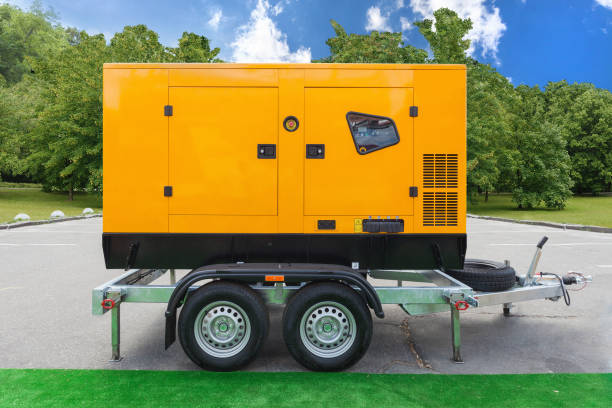 générateur de frais diesel mobile pour moyenne d’énergie électrique à l’extérieur contre les arbres verts et ciel bleu - générateurs dénergie photos et images de collection