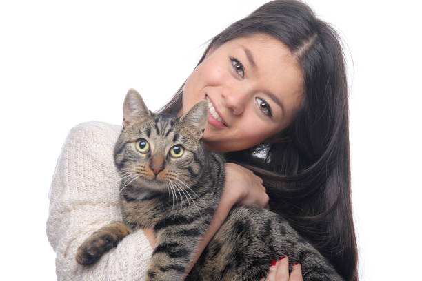 istock Asian woman with a cat 1083878014