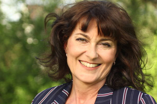 istock Beautiful mature woman outside 1083878486