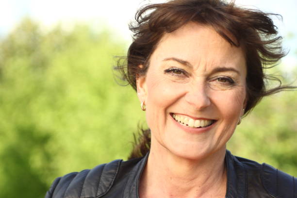 istock Beautiful mature woman outside 1083878626