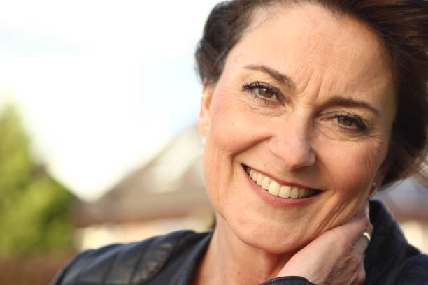 istock Beautiful mature woman outside 1083878652