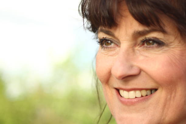 istock Beautiful mature woman outside 1083878656