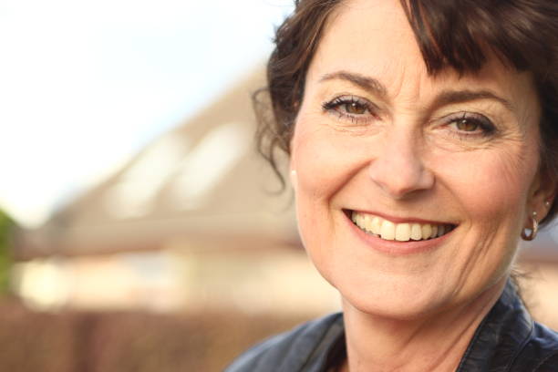 istock Beautiful mature woman outside 1083878658