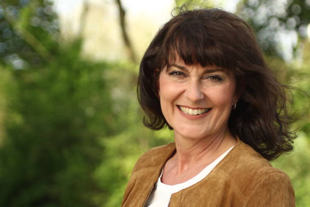 istock Beautiful mature woman outside 1083878674
