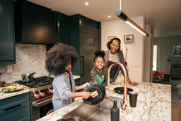 istock Evening routine in the kitchen for the family with siblings 1083896608