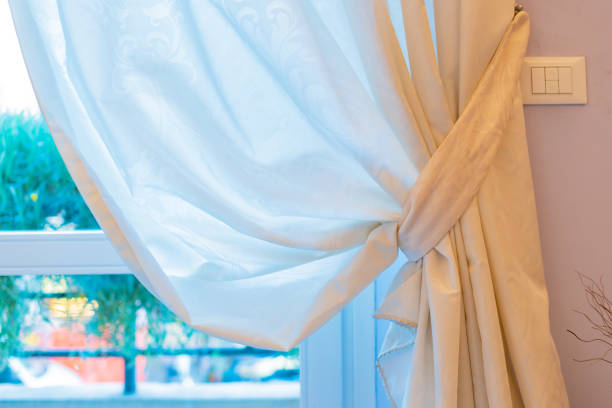 istock white curtain house design concept 1083897316