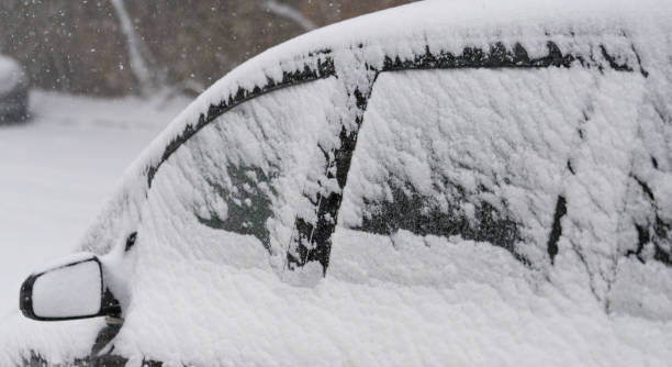 istock Blizzard in Sofia city on 16.12.2018 - a car covered with snow 1083900322