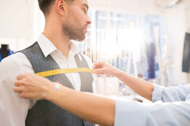 istock Man Getting Fitted for Bespoke Suit in Atelier 1083903250