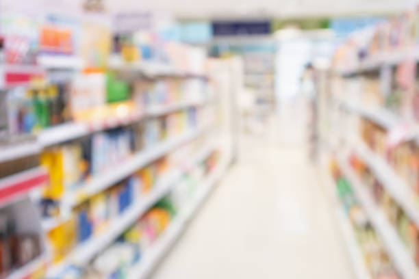 Pharmacy drugstore blur abstract background with medicine and vitamin product on shelves Pharmacy drugstore blur abstract background with medicine and vitamin product on shelves over the counter meds stock pictures, royalty-free photos & images