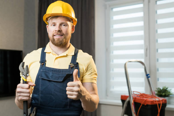 istock Satisfied repairman with wrench 1083903826