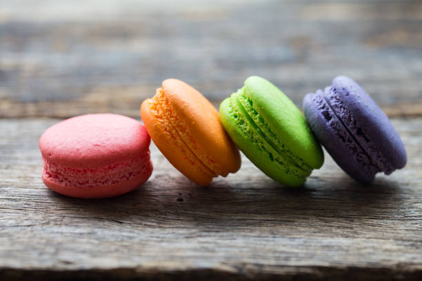 istock macaroons on wooden floor 1083928634
